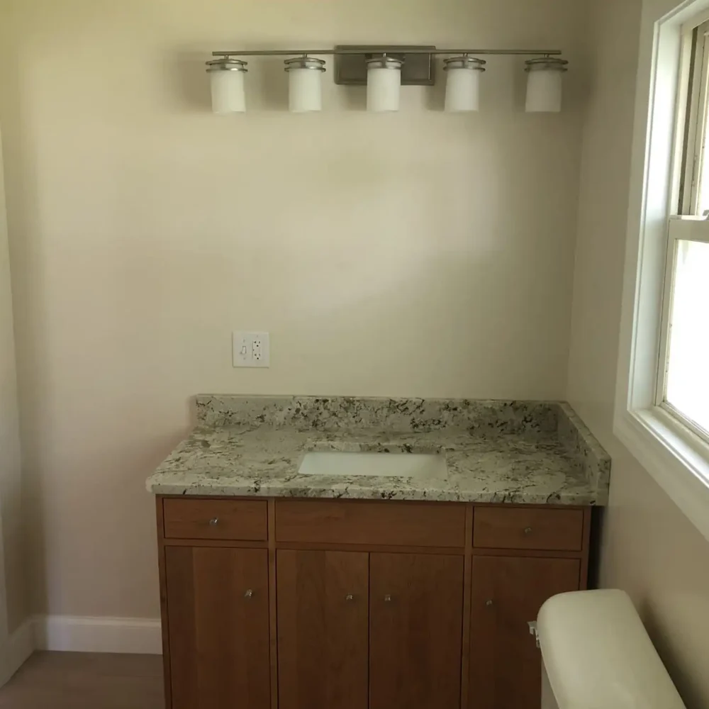 Small Bathroom Remodel with Granite Counters and Custom Cabinetry